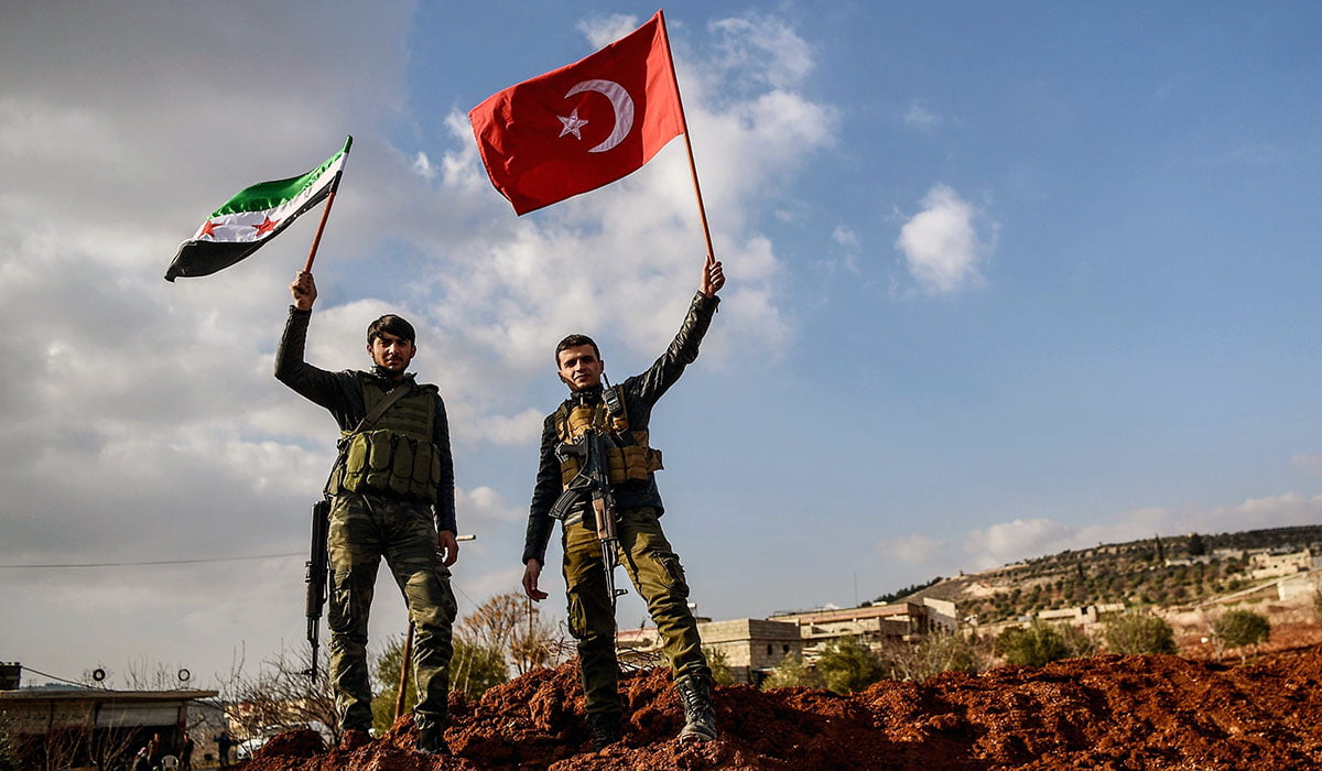 Topshot A Turkish Backed Syrian Rebel Fighters Hold Turkish Na