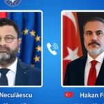 Γραφικό του ρουμανικού υπουργείου Εξωτερικών με τα πορτρέτα του Νταν Νεκουλαέσκου και του Χακάν Φιντάν και σύμβολο τηλεφώνου